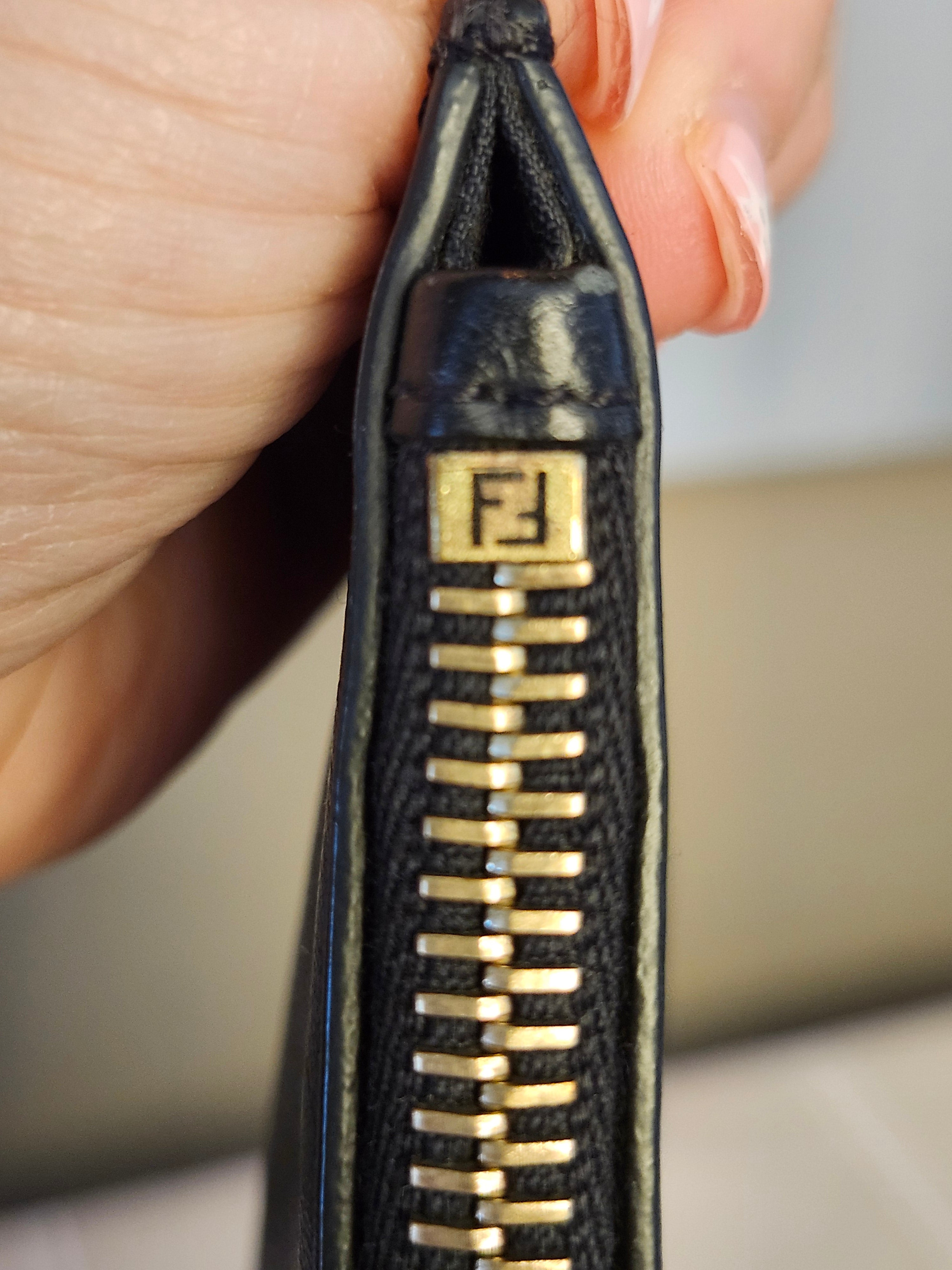 Fendi Black Leather Monster Clutch with Gold Accents