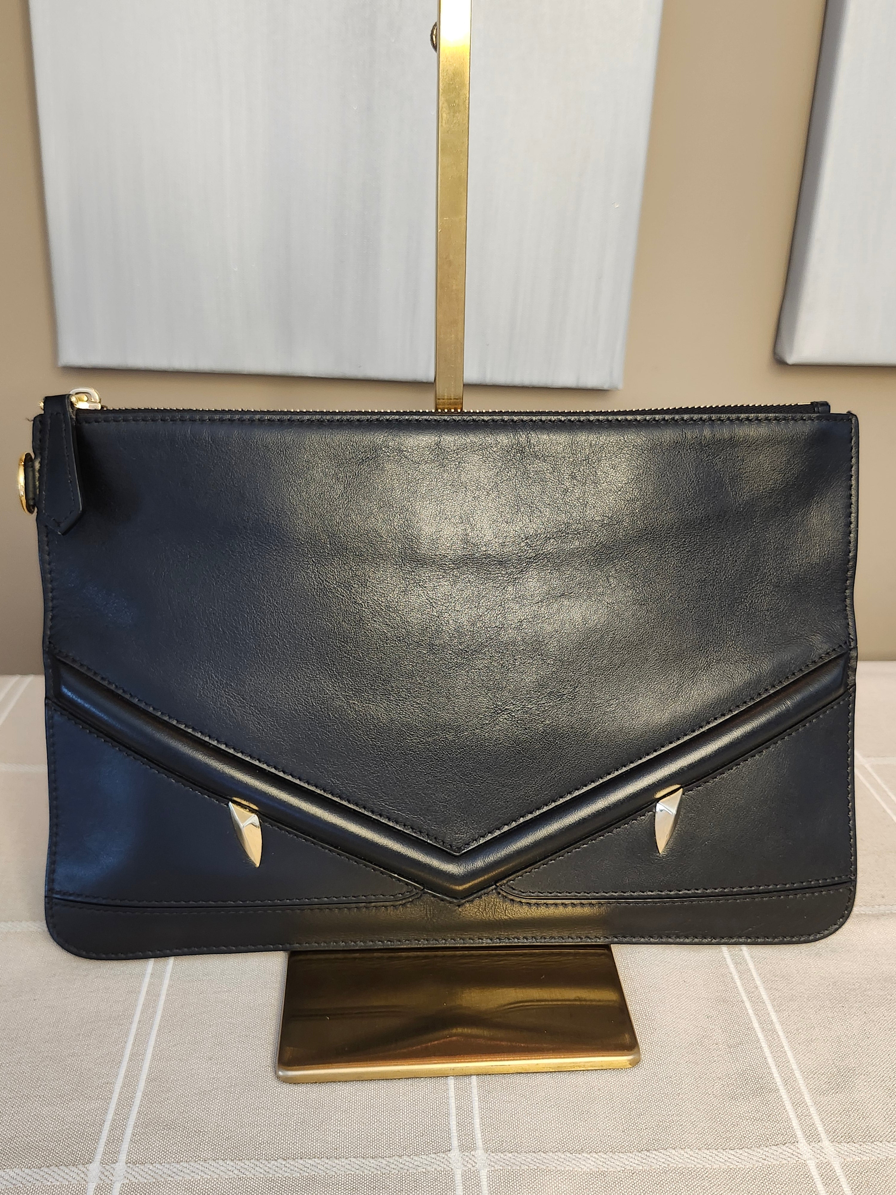 Fendi Black Leather Monster Clutch with Gold Accents
