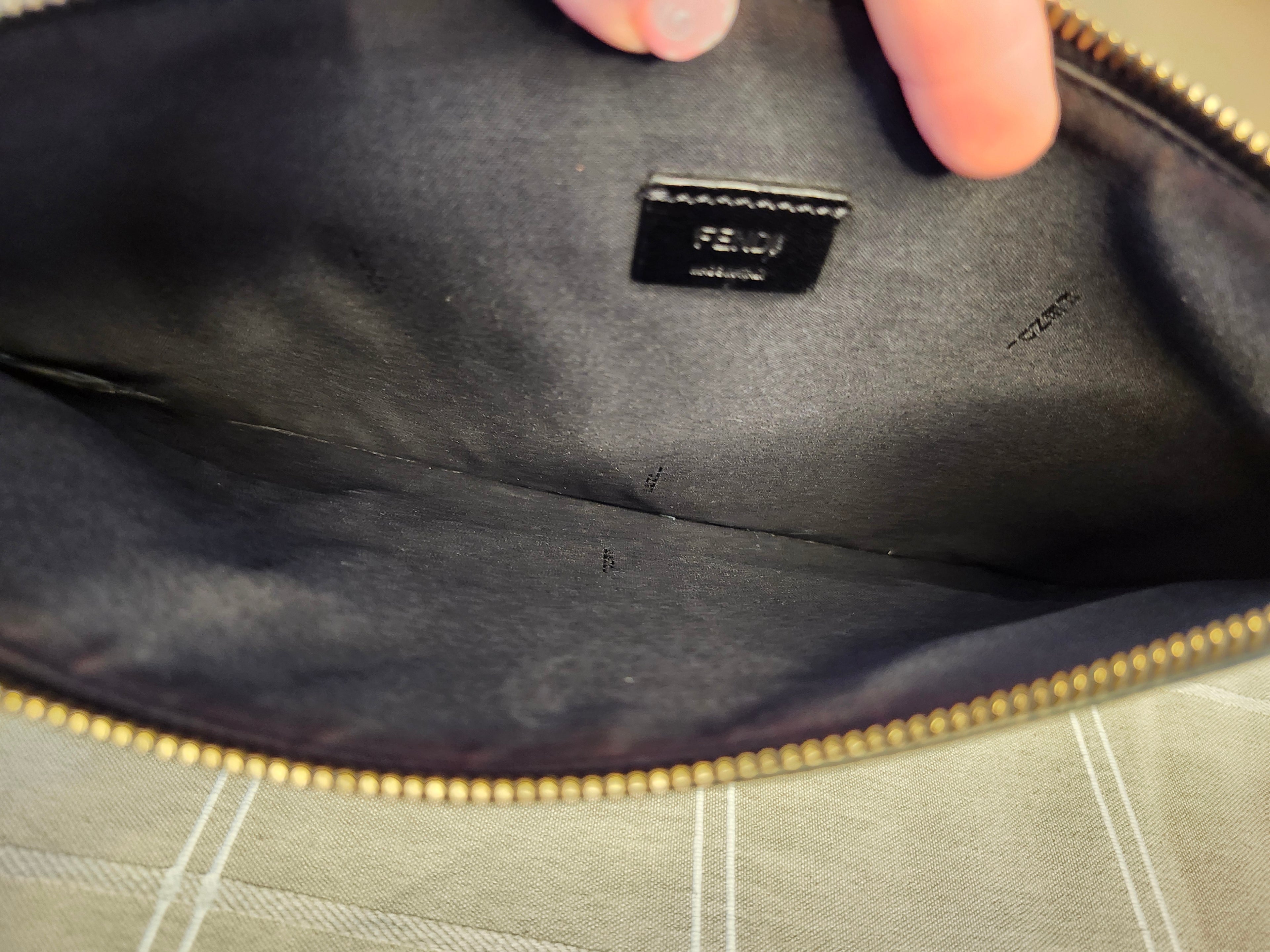 Fendi Black Leather Monster Clutch with Gold Accents