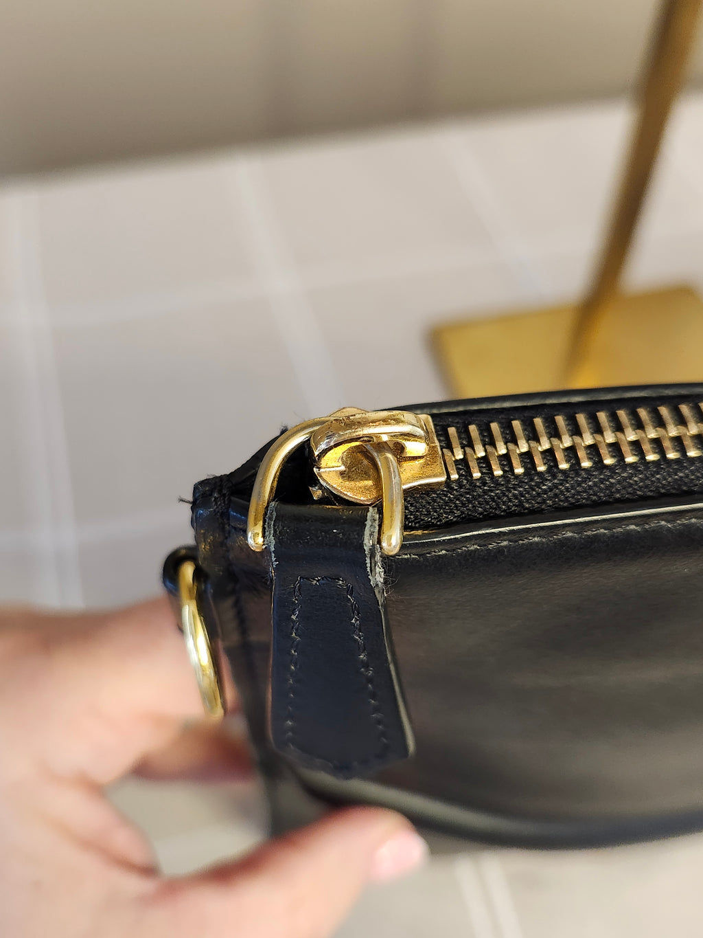 Fendi Black Leather Monster Clutch with Gold Accents