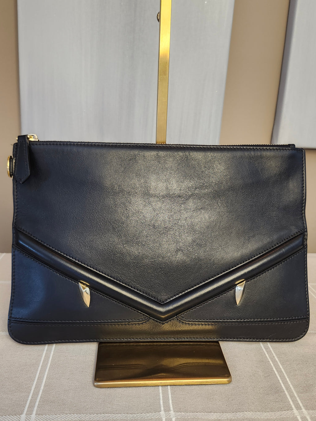 Fendi Black Leather Monster Clutch with Gold Accents