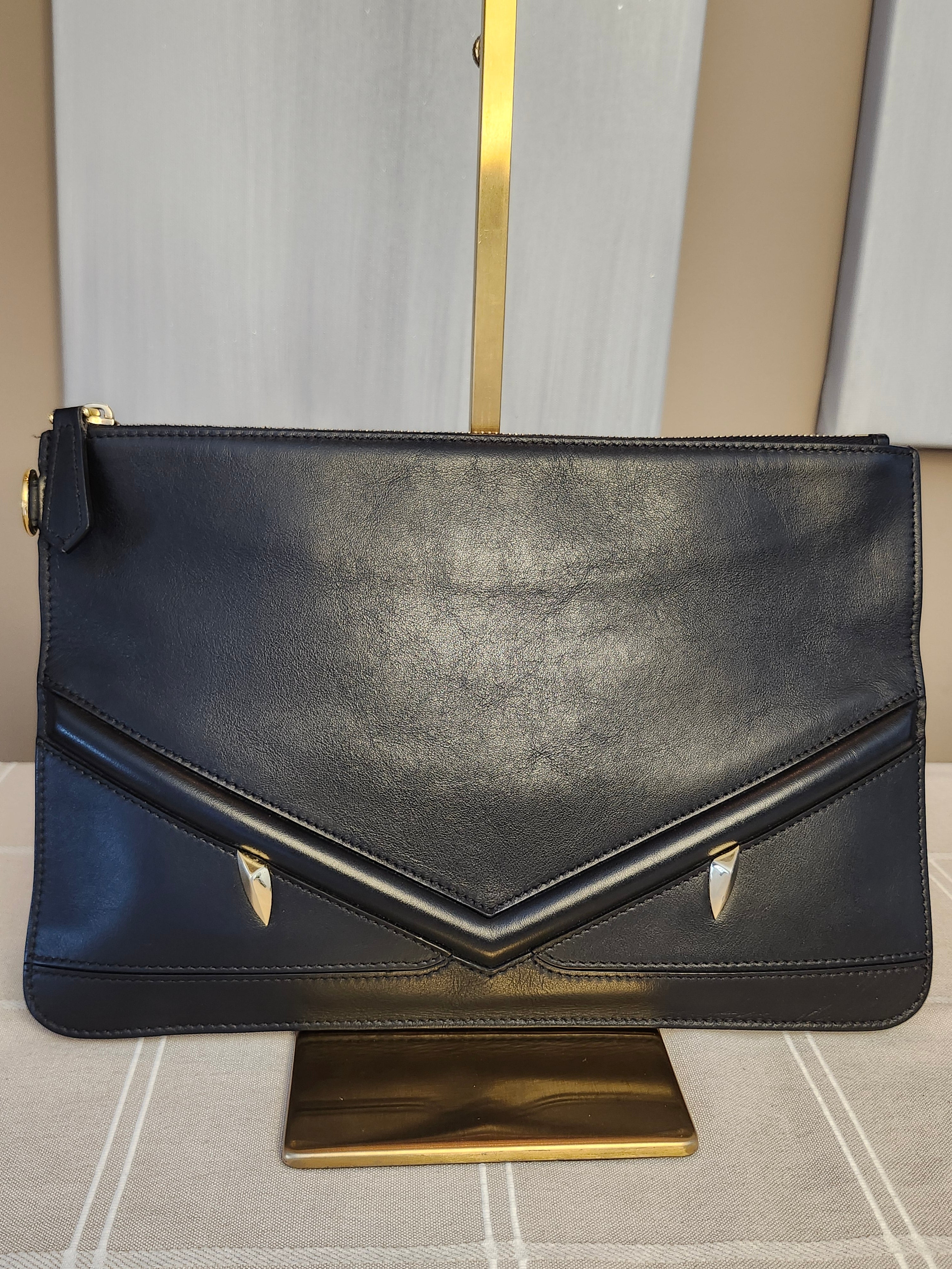 Fendi Black Leather Monster Clutch with Gold Accents