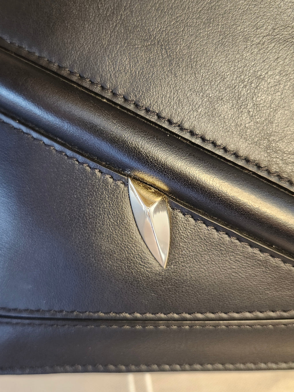 Fendi Black Leather Monster Clutch with Gold Accents