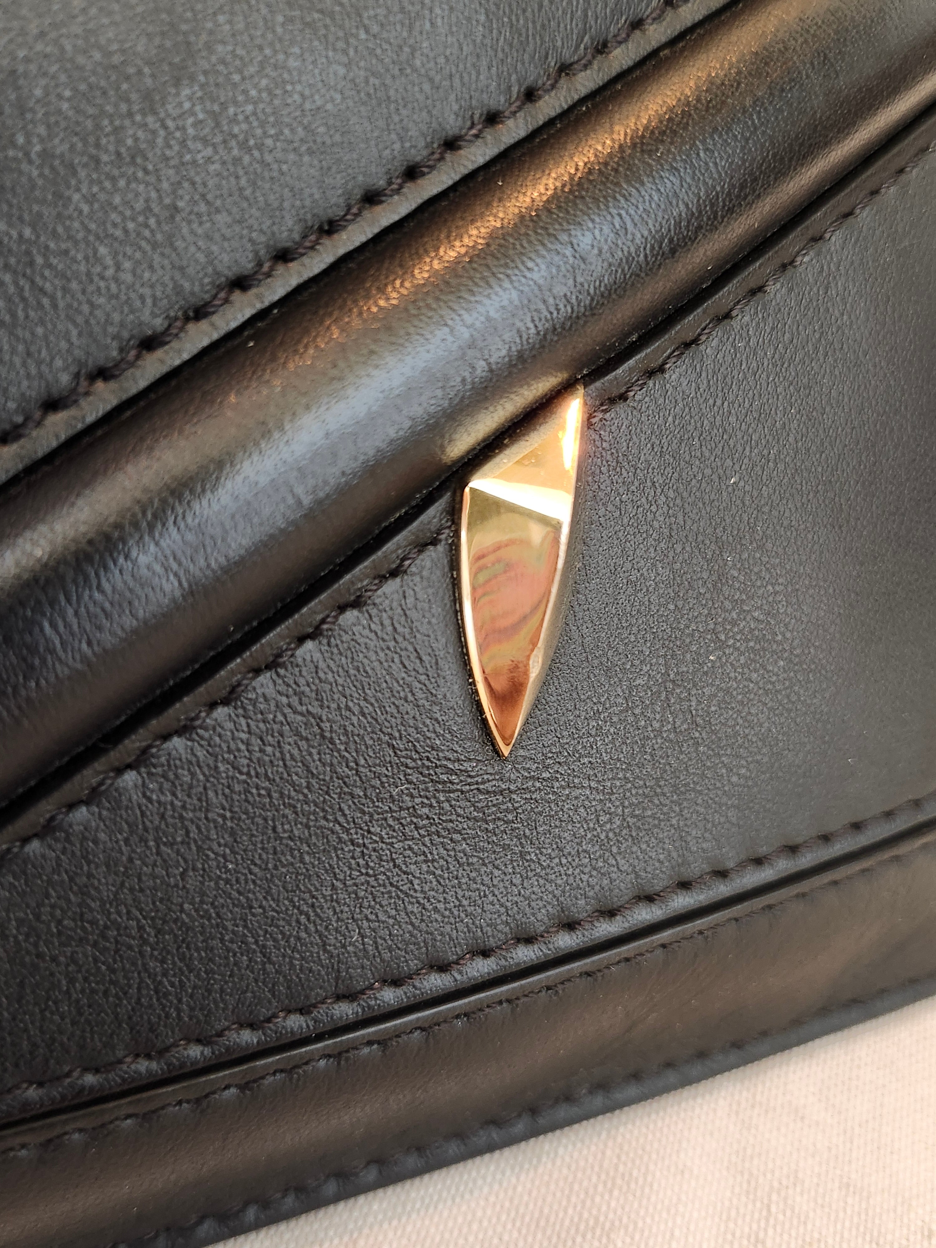 Fendi Black Leather Monster Clutch with Gold Accents