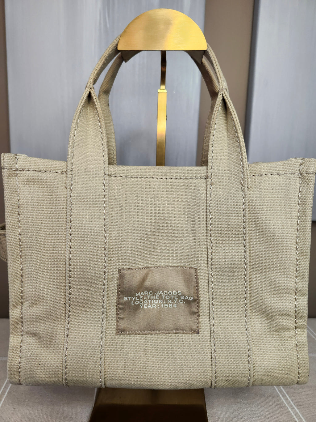 Marc Jacob's The Tote Bag Canvas Tote in Beige Canvas with Black Strap