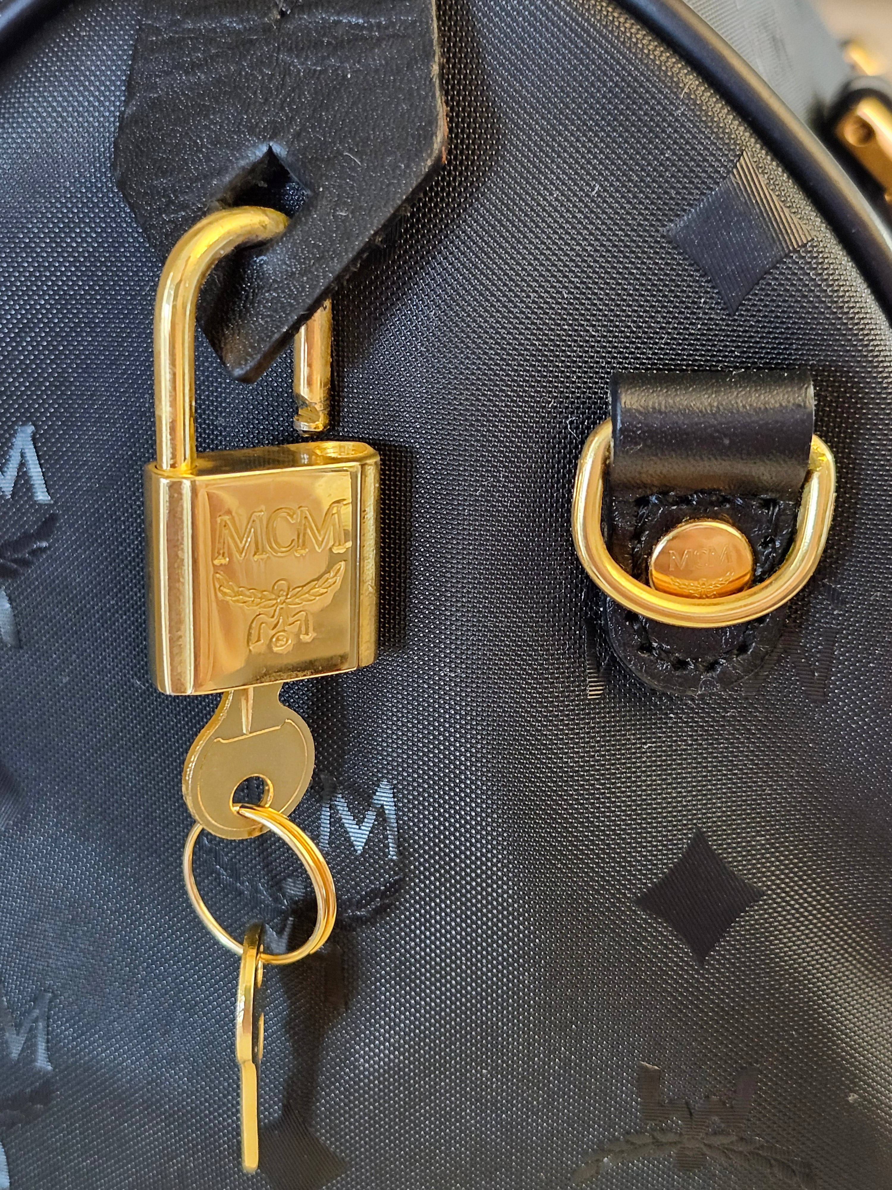MCM Visetos Monogram Black Boston Bag with Gold Hardware Lock and Keys Included